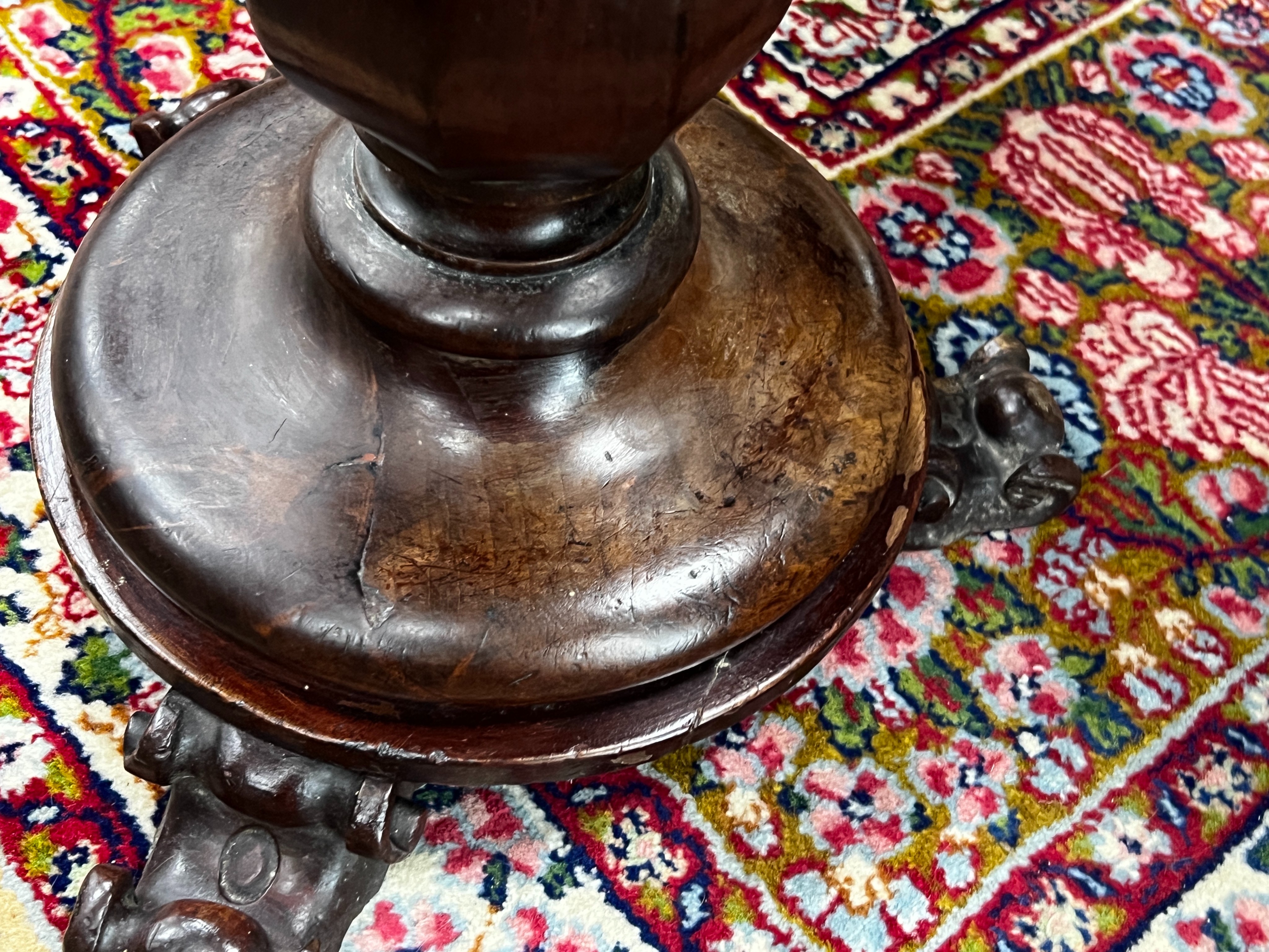 An early Victorian mahogany revolving piano stool